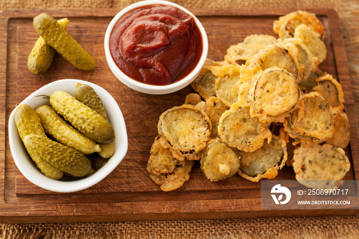 Battered fried pickles with ketchup