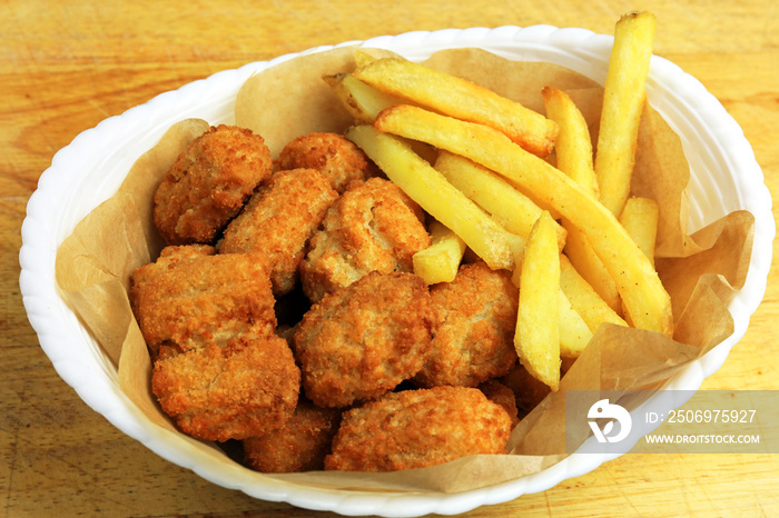 Deep Fried Breaded Scampi With Chunky Chips Served In A Basket