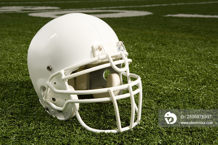 Helmet on American football field