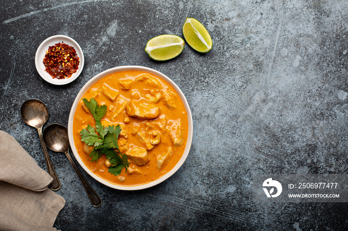 Chicken and cashew red curry, thai inspired dish overhead view