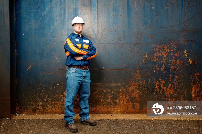 Portrait of industrial worker with arms crossed