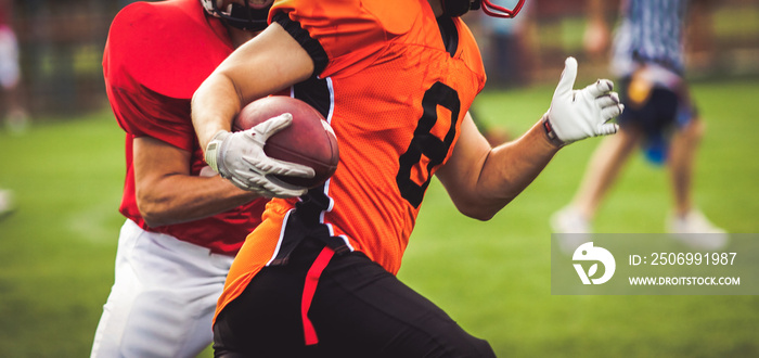 american football players during a game