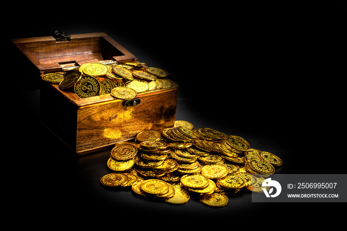 Stacking Gold Coin in treasure chest  on black background