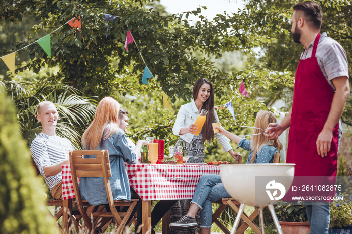 Friends partying in garden