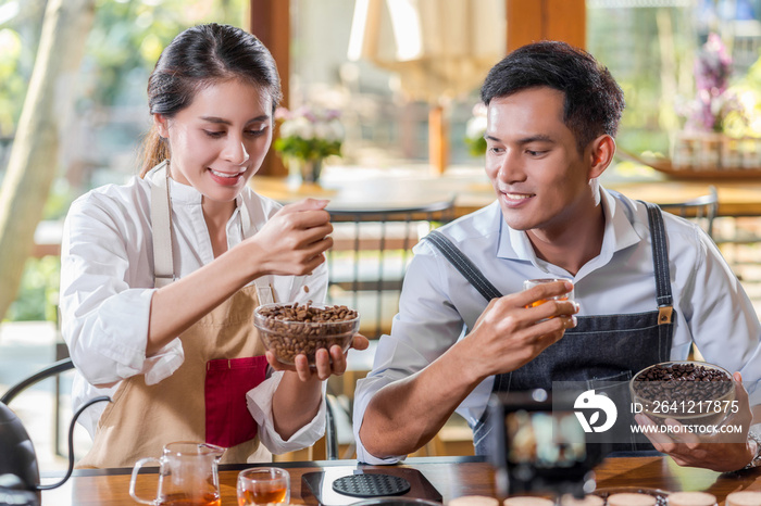 Asian two partner of small business owner showing and presenting the how to making coffee by drip me