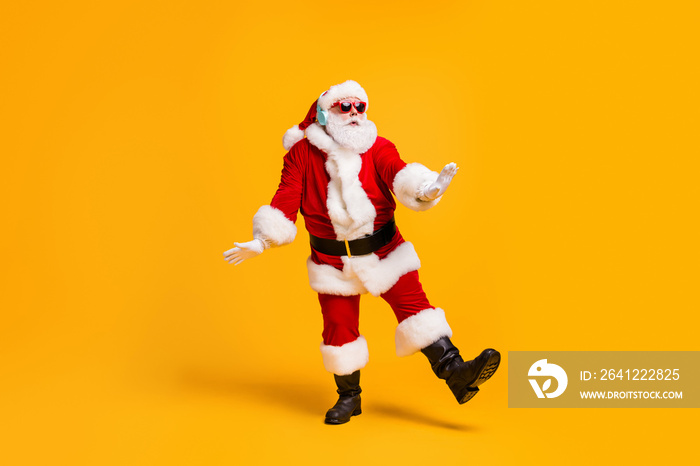 Full size photo of funky santa claus with grey beard listen magic x-mas christmas music headset danc