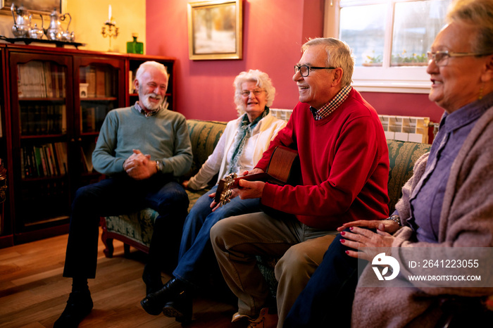 Old folks playing guitar and singing