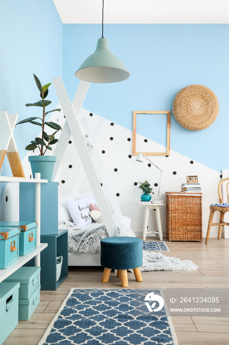 Interior of modern childrens room with comfortable bed