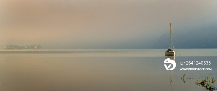 morning on the lake in sepia color