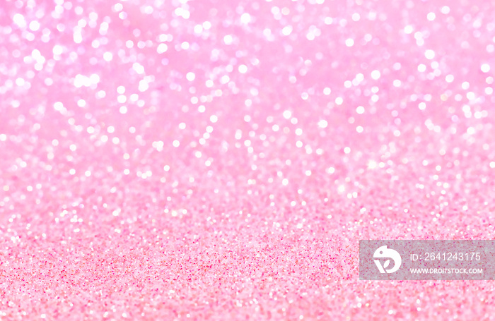 Shiny blurred pink background with bokeh for a festive mood. Greeting card template for entertainmen