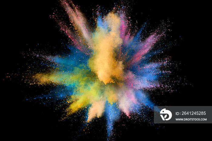 Colored powder explosion. Abstract closeup dust on backdrop. Colorful explode. Paint holi