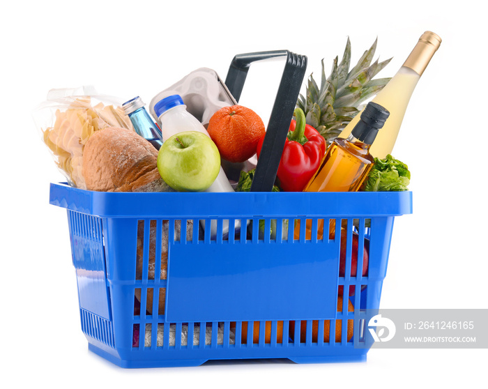 Plastic shopping basket with assorted grocery products