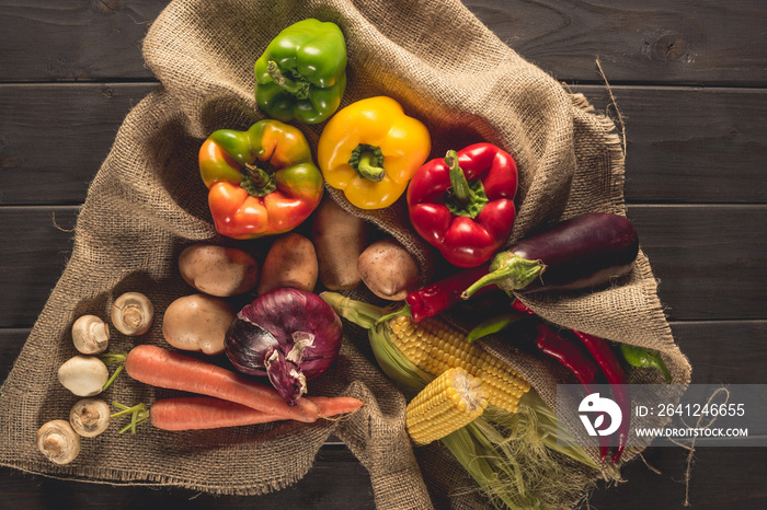 fresh picked vegetables on sacking