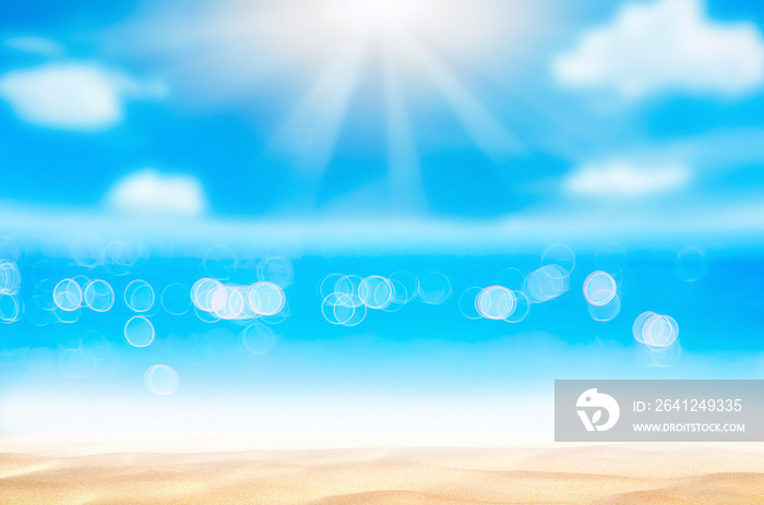 Blur tropical beach with bokeh sun light wave abstract background.