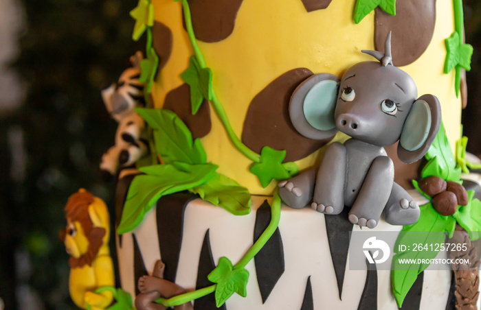 Safari animals themed baby shower cake