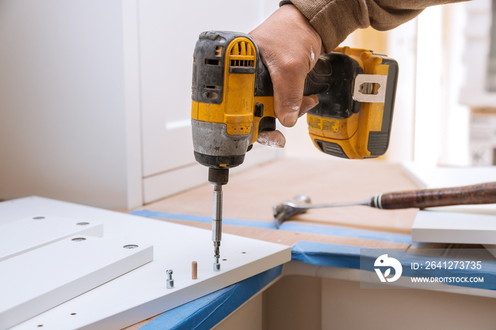 Hinge drawers assembly on assembling flat pack furniture