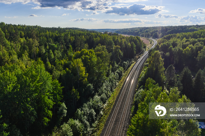 Aerial view of the railway track. The railroad between the hills.