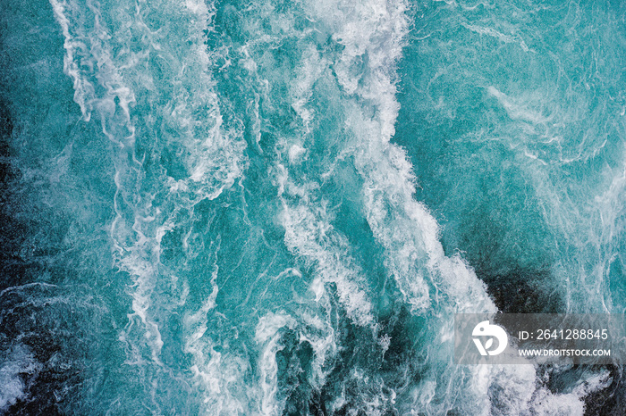 Bruarfoss waterfall in Iceland as an abstract of the blue water and whitewater from above