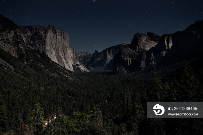 Scenic view of mountains against sky at night