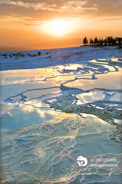 Carbonate travertines the natural pools during sunset, Pamukkale, Turkey - UNESCO HERITAGE