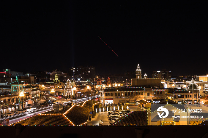 Long Exposure of City at Night Decorated for Christmas. Rooftop View of Christmas City. Festive Ligh