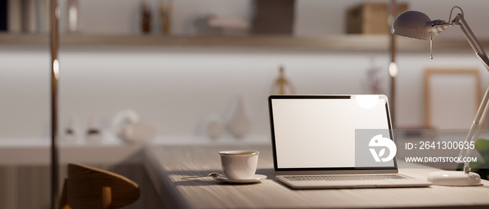 Modern home office interior with portable laptop computer.