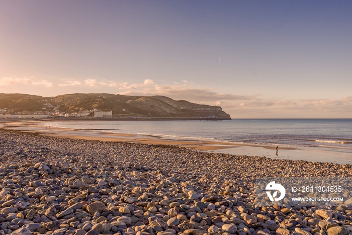 Seafront and Great Orme at Llandudno at dusk.