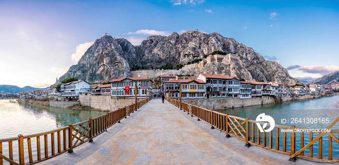 Old Ottoman houses evening panoramic view by the Yesilirmak River in Amasya City. Amasya is populer 