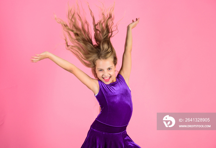 Ballroom latin dance hairstyles. Kid girl with long hair wear dress on pink background. Things you n