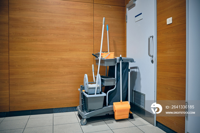 Cleaning tools cart. Airport cleaning service equipment