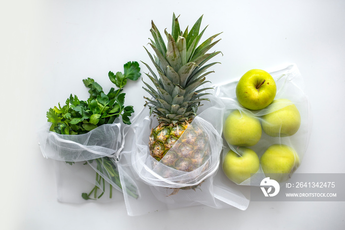 Groceries in eco bags. eco natural bags with fruits and vegetables, eco friendly, flat lay. sustaina