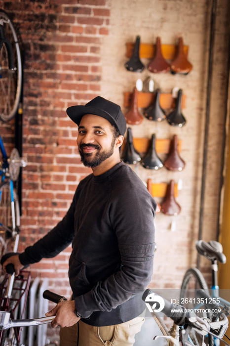 Portrait of bicycle shop owner