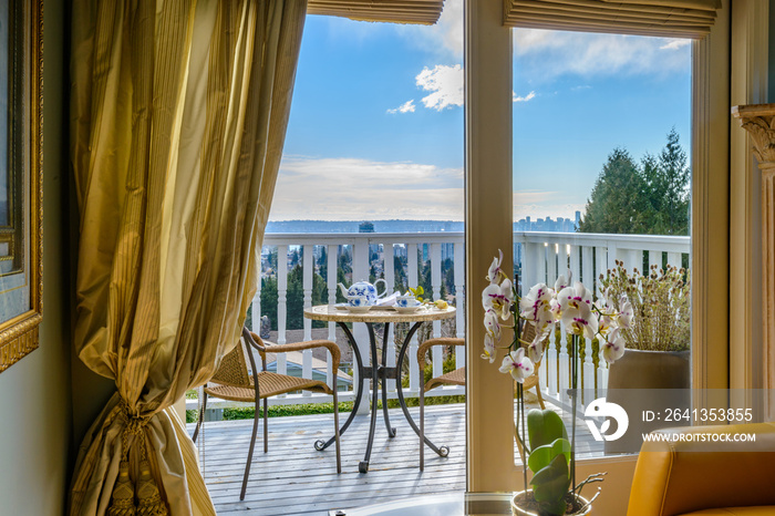 Fragment of interior design of a luxury boutique living room with balcony.