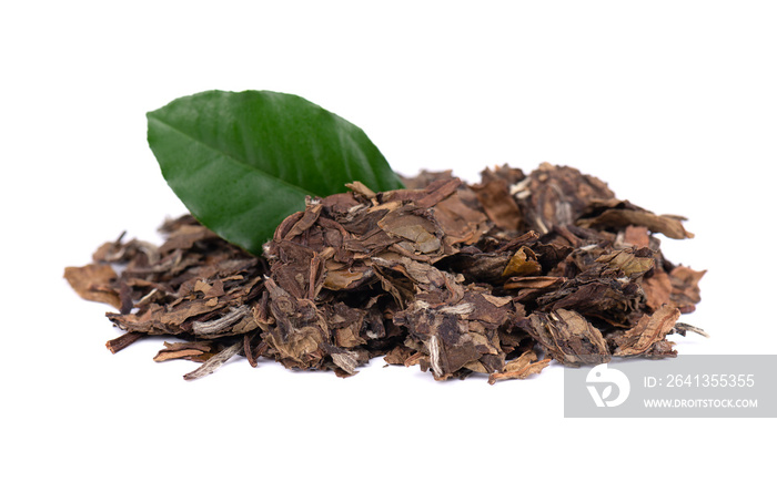 White puer tea, isolated on white background. Chinese tea Puer. Pressed fermented Pu-erh tea. Macro 