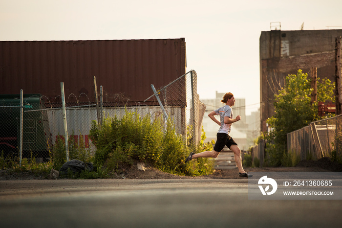 Man jogging in street