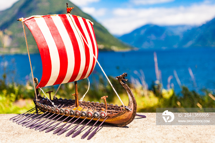 Viking boat on fjord shore, Norway