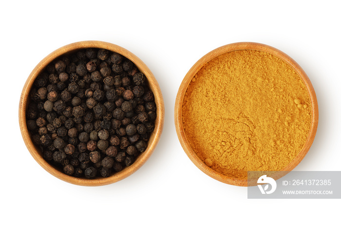 白底木碗中的黑胡椒和姜黄——姜黄和黑胡椒的概念