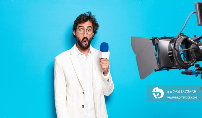 young bearded man television presenter.