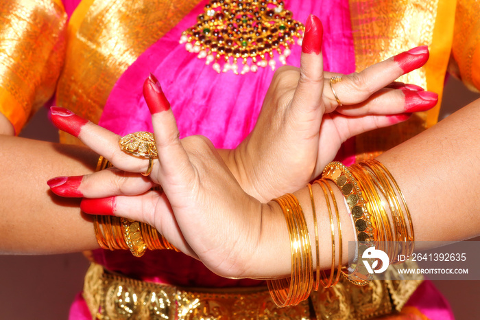 Woman hand of professional Indian dancer demonstrates dance mudra (gesture) of Bharatanatyam classic