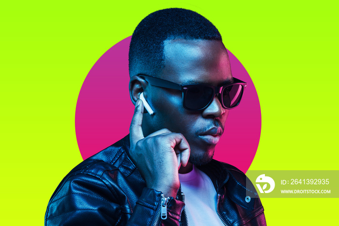 African american man portrait, wearing trendy sunglasses and leather cyberpunk style jacket, isolate