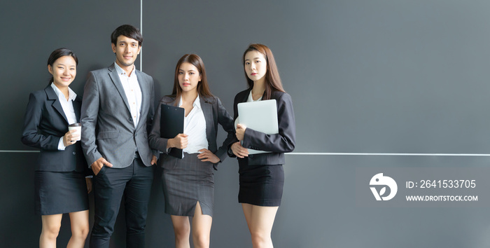 Portrait of Asian creative business team. on formal suit front of building office