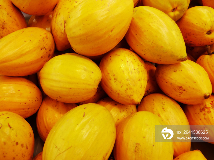 Close up shot of exotic yellow papaya fruits