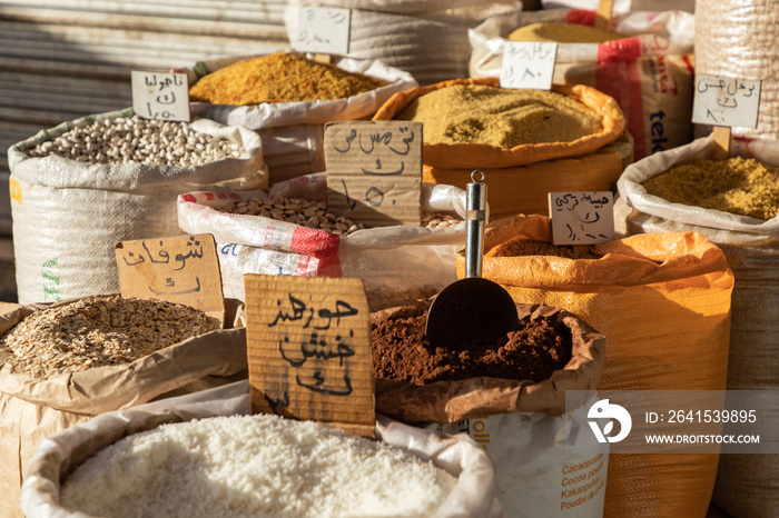 Spices, nuts and sweets shop on the market in Amman downtown, Jordan. Choice of Arabic spices on the