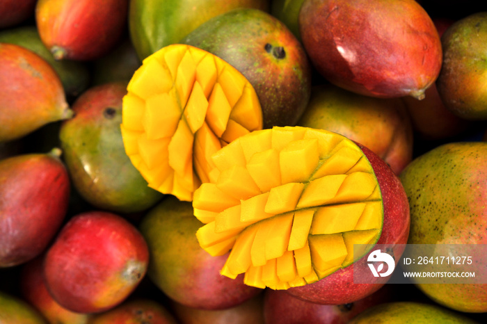 Close up fresh mango fruit on market stall in southern Spain