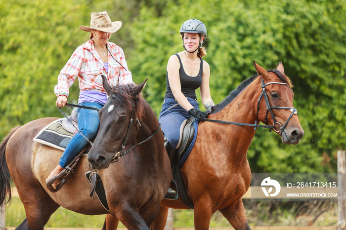 Women cowgirl and jocket riding horse. Activity.