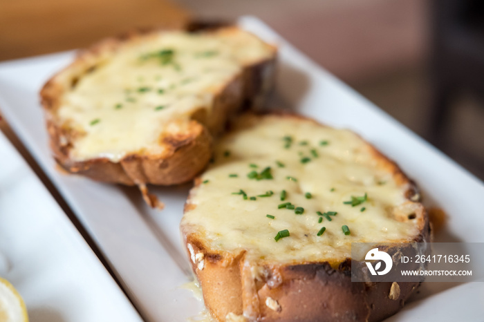 Garlic Bread with Cheese on plate