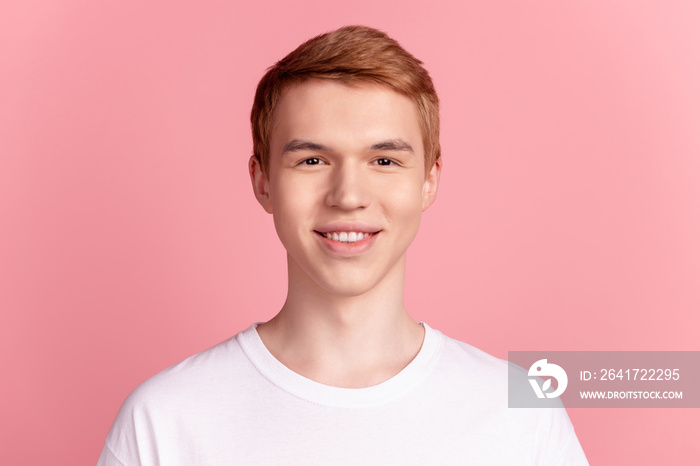 Photo of young cheerful guy good mood toothy smile cavity protection stomatology isolated over pink 