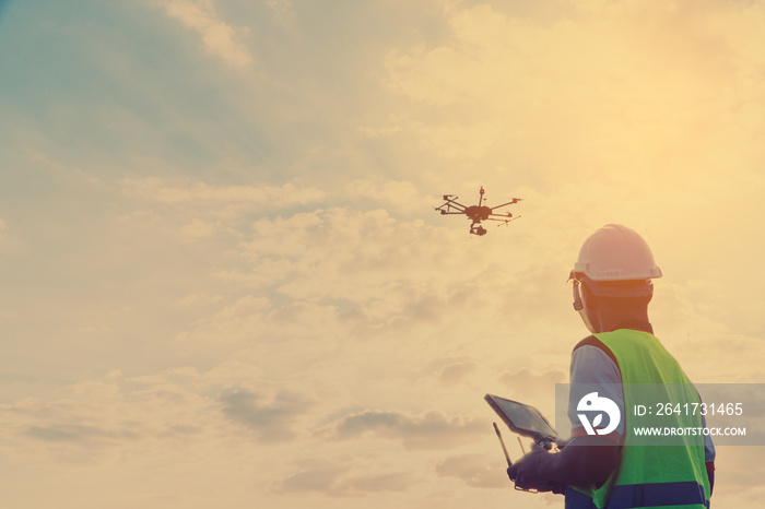 Engineer inspect and checking solar panel by Drone at solar power plant