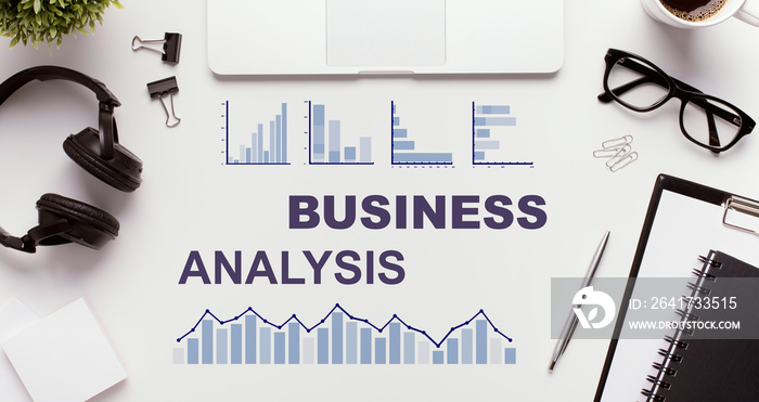 Business analysis concept. Graphs and texts on office table