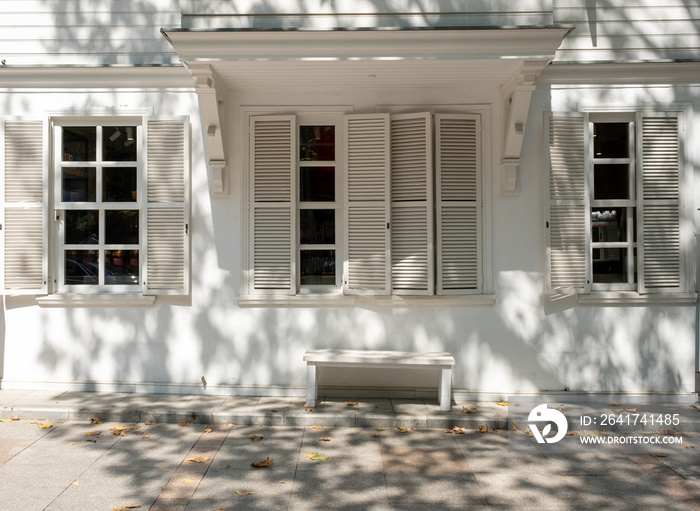 white wooden house exterior. Facede window